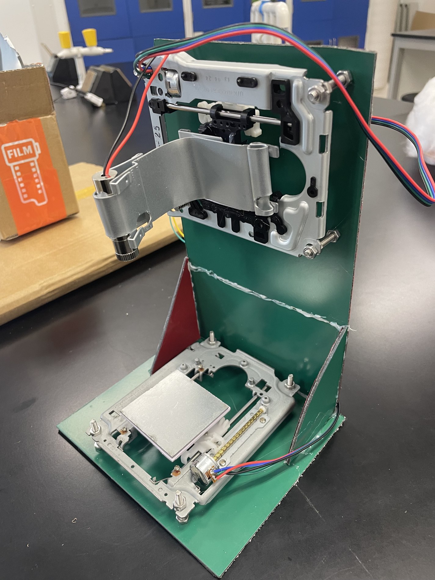 A homemade 3D laser engraving machine frame, assembled from salvaged parts
