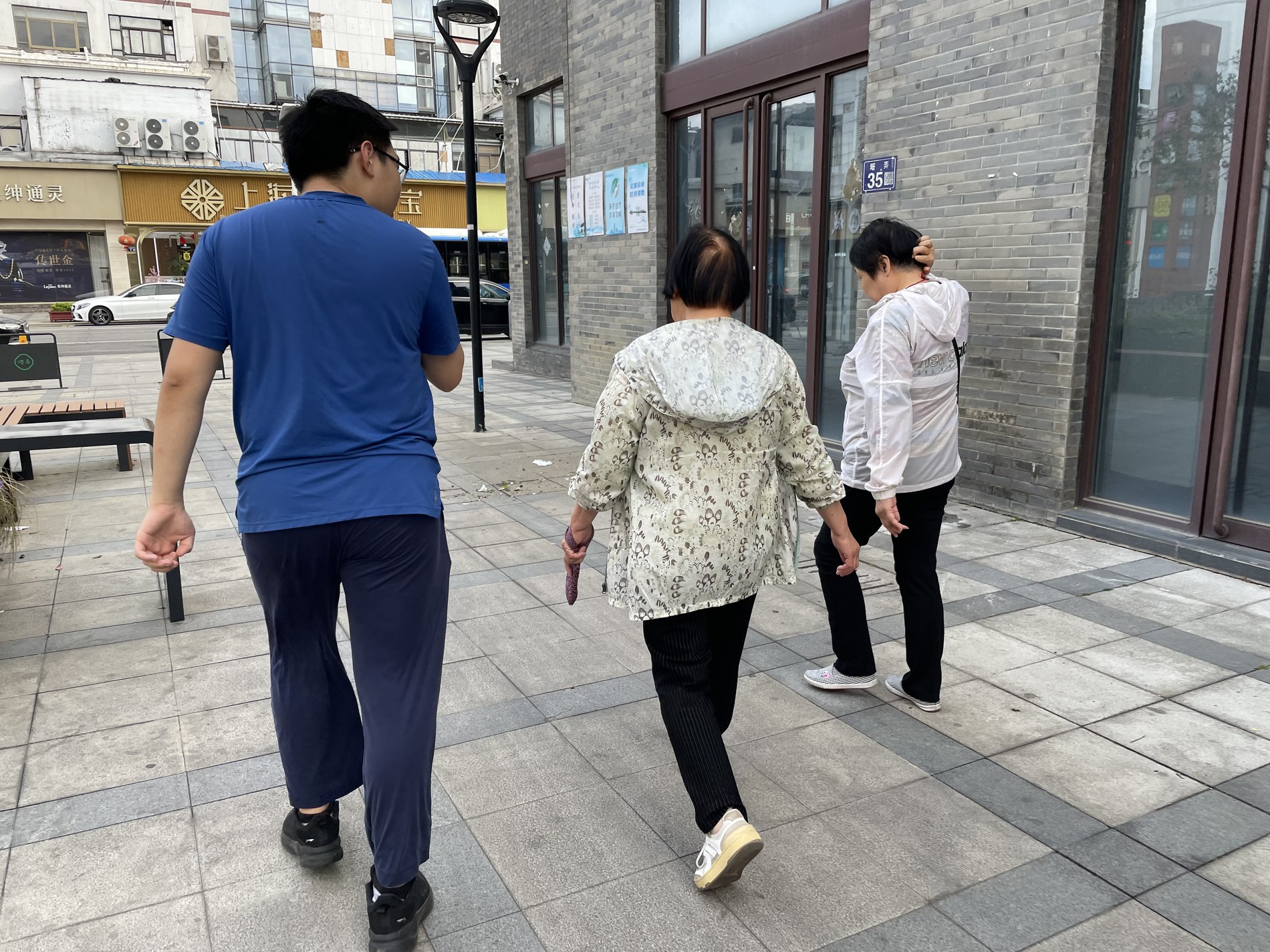 Interview subjects walking through the neighbourhood