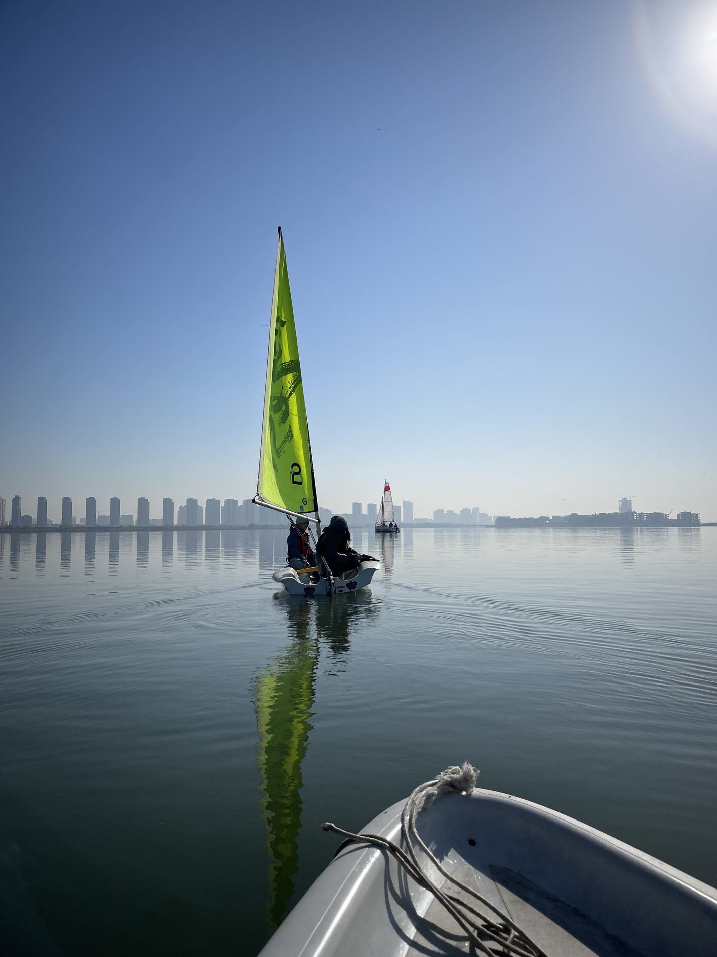Sailing a small boat on calm water