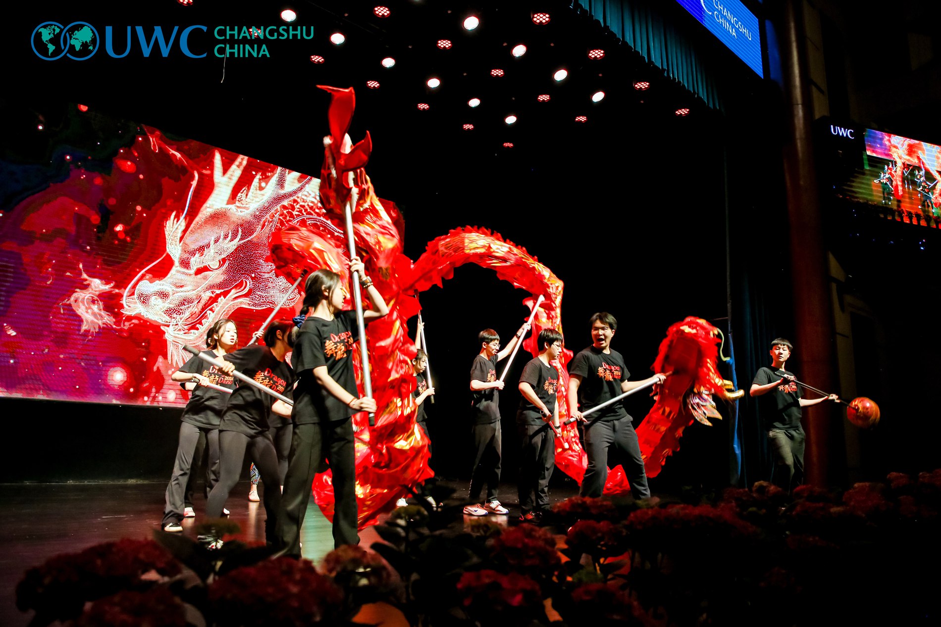 Dragon dance performance at UWC Changshu, dragon raised overhead