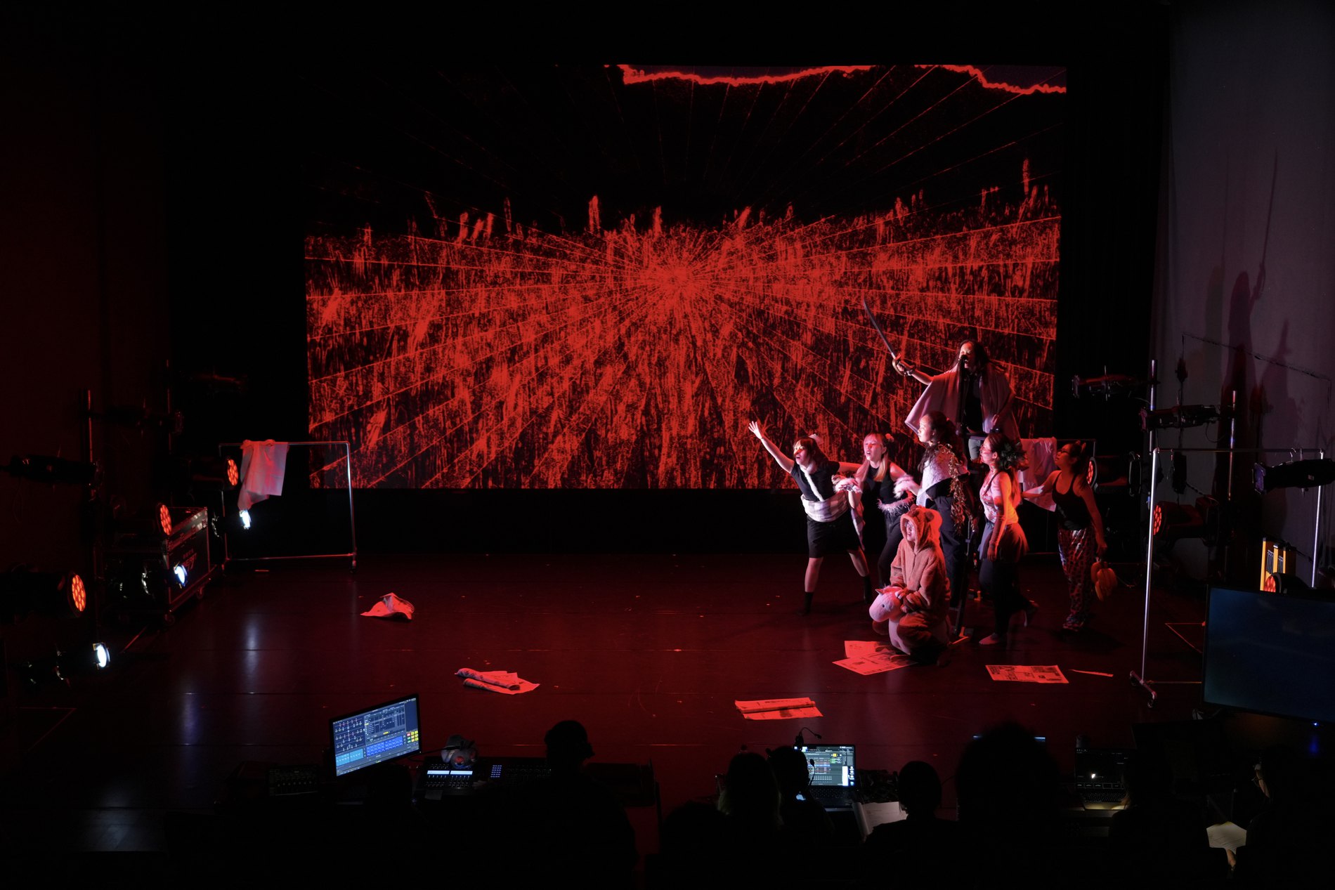 Red-lit stage during the production What Does Animal Say at Shanghai YOUNG Theatre